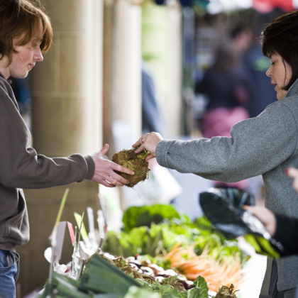 A lady serving at the markets 