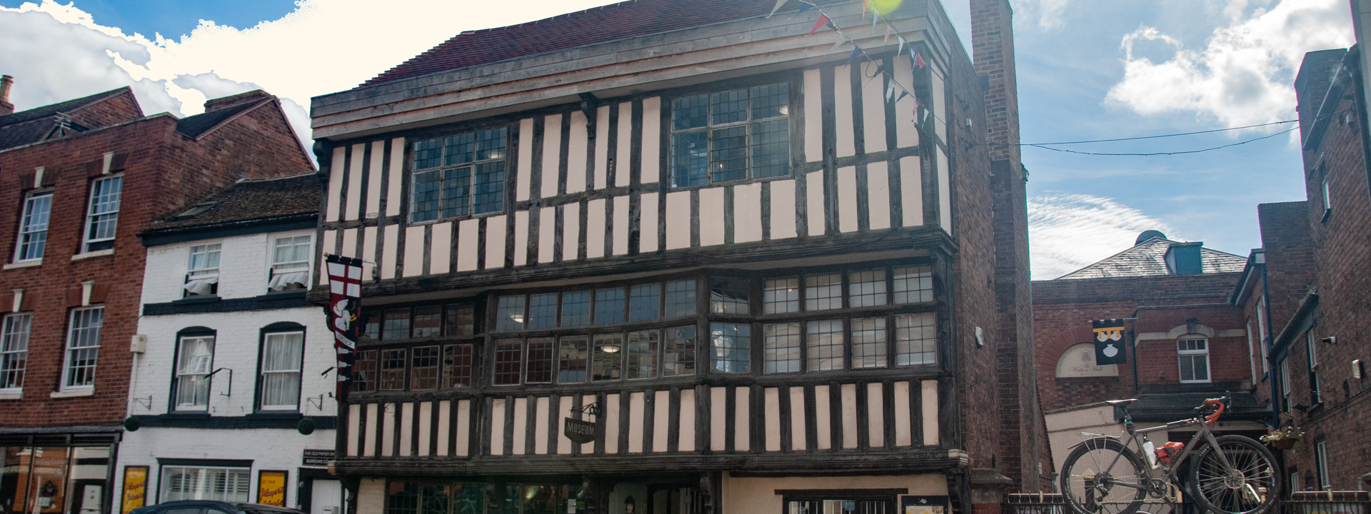 The exterior of Tewkesbury Museum a timber framed building 
