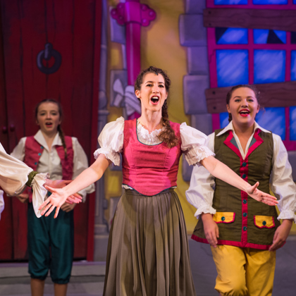 A lady singing in the panto at The Roses Theatre - Jack Boskett