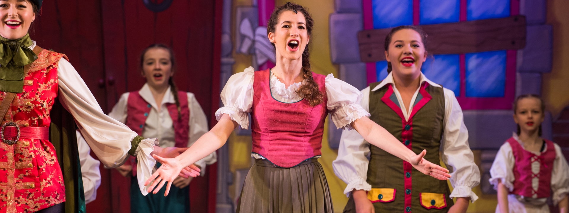 A lady singing in the panto at The Roses Theatre - Jack Boskett
